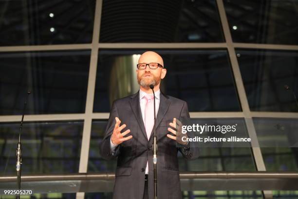 General secretary Peter Tauber talks to the press after taking part in the first round of coalition talks to form the next government begin in...