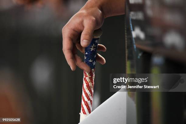 Wil Myers of the San Diego Padres rests his hand on his American flag wrapped bat during the MLB game against the Arizona Diamondbacks at Chase Field...