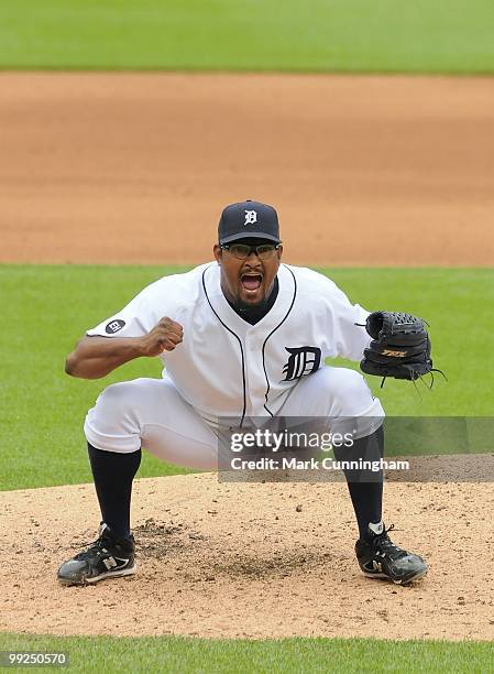 Jose Valverde of the Detroit Tigers yells in celebration of striking out Nick Swisher of the New York Yankees for the final out of the first game of...