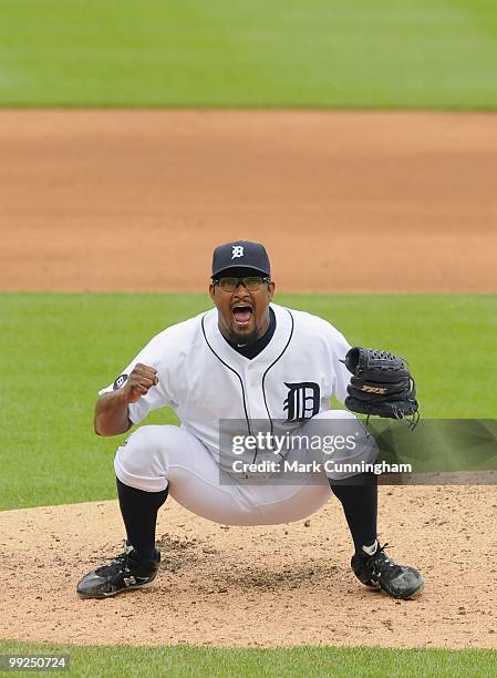 Jose Valverde of the Detroit Tigers yells in celebration of striking out Nick Swisher of the New York Yankees for the final out of the first game of...