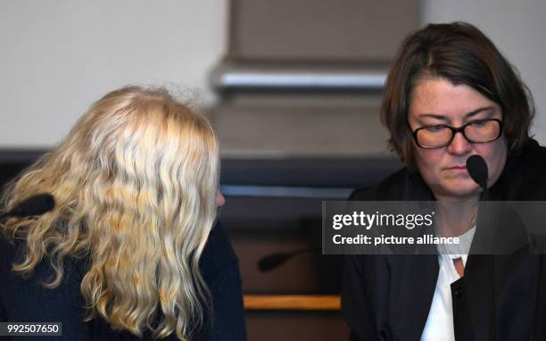 The defendant Kathrin W. Sits next to her lawyer Eva Dworschak at the district court in Verden, Germany, 19 October 2017. He is one of the four...