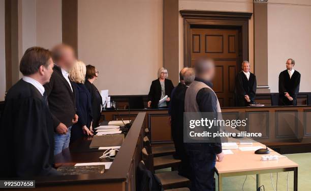 Lawyer Herbert Boeker , defendants Manfred W., Kathrin W. And the latters lawyer Eva Dworschakm as well as defendant Neal B. , his lawyer Wolf...