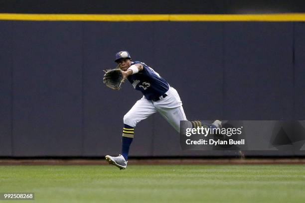 Keon Broxton of the Milwaukee Brewers catches a fly ball in the seventh inning against the Atlanta Braves at Miller Park on July 5, 2018 in...