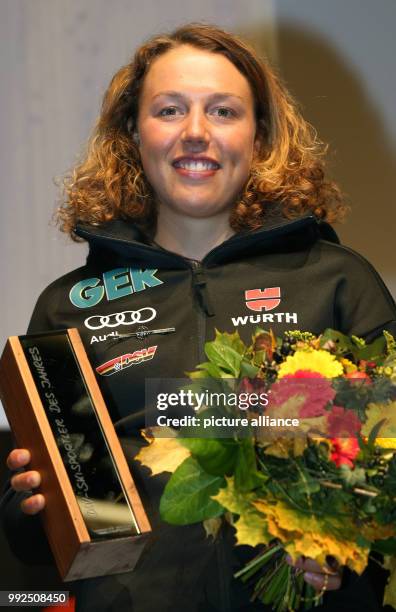 Five time biathlon world champion Laura Dahlmeier smiles during the award ceremony naming her Germany's "Ski athlete of the Year" during the seasonal...