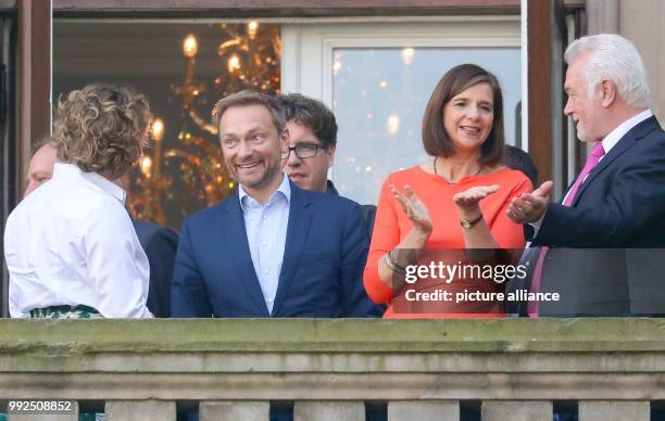 Katrin Goering-Eckardt , faction leader of Alliance 90/The Greens, speaks with FDP federal chairman Christian Lindner and FDP deputy chairman...