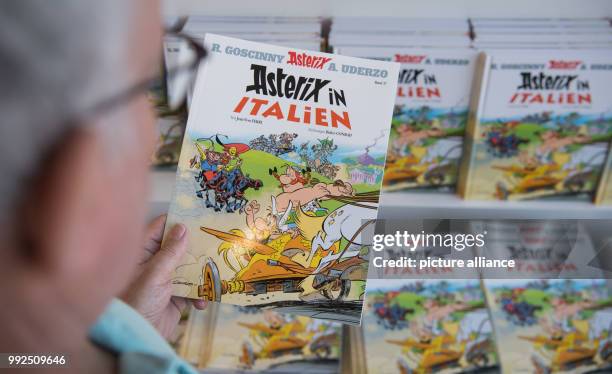 New copies of the comics "Asterix in Italy" can be seen at the book store "Wittwer" in Stuttgart, Germany, 19 October 2017. Photo: Marijan Murat/dpa