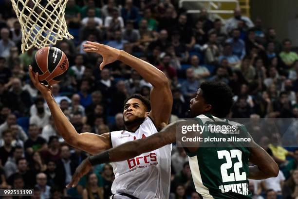 Bamberg's Augustine Rubit in action against Kenny Gabriel of Athens during the Euroleague basketball match between Panathinaikos Athens and Brose...