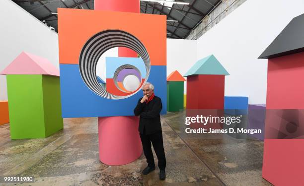 Artist Daniel Buren with his work 'Like Child's Play ' at Carriageworks on July 6, 2018 in Sydney, Australia. It is Buren's first solo show in...