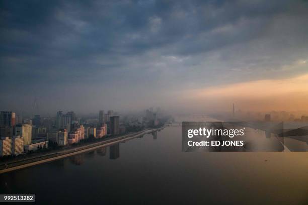 This photo taken on June 19, 2018 shows a general view of the Pyongyang city skyline and the Taedong river. - US Secretary of State Mike Pompeo was...