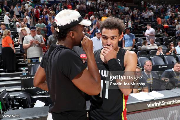 Donovan Mitchell of the Utah Jazz speaks to Trae Young of the Atlanta Hawks after the game on July 5, 2018 at Vivint Smart Home Arena in Salt Lake...