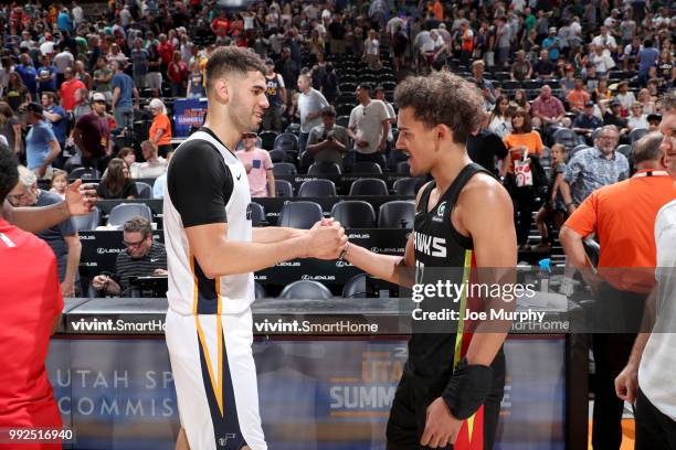 Georges Niang of the Utah Jazz shakes hands with Trae Young of the Atlanta Hawks after the game on July 5, 2018 at Vivint Smart Home Arena in Salt...