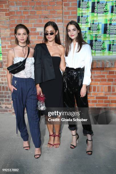 Lisa-Marie Koroll, Nilam Farooq und Luise Befort attend the HUGO show during the Berlin Fashion Week Spring/Summer 2019 at Motorwerk on July 5, 2018...