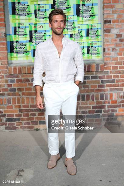 Blogger Andre Hamann attends the HUGO show during the Berlin Fashion Week Spring/Summer 2019 at Motorwerk on July 5, 2018 in Berlin, Germany.