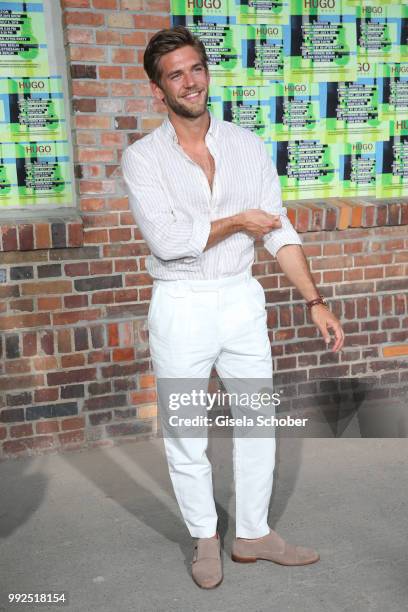 Blogger Andre Hamann attends the HUGO show during the Berlin Fashion Week Spring/Summer 2019 at Motorwerk on July 5, 2018 in Berlin, Germany.