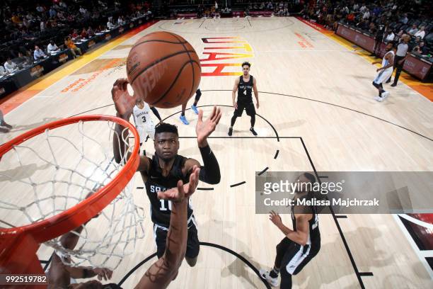 Chimezie Metu of the San Antonio Spurs grabs the rebound against the Memphis Grizzlies on July 5, 2018 at Vivint Smart Home Arena in Salt Lake City,...