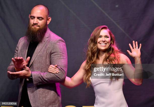 Ronda Rousey walks on stage with husband Travis Browne during the UFC Hall of Fame Class of 2018 Induction Ceremony inside The Pearl concert theater...