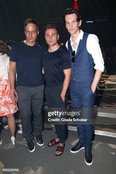 Tom Wlaschiha, Jannik Schuemann, Sabin Tambrea attend the HUGO show during the Berlin Fashion Week Spring/Summer 2019 at Motorwerk on July 5, 2018 in...