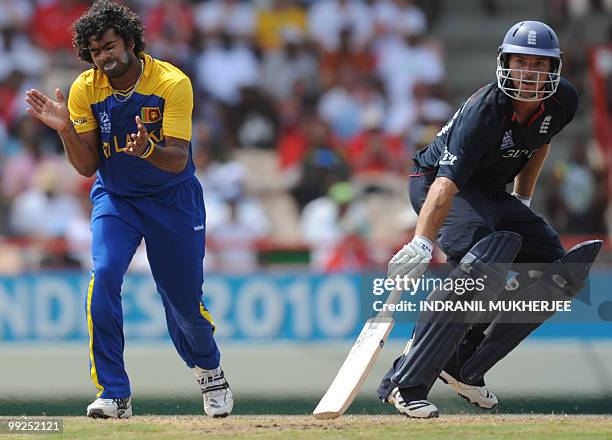 Sri Lankan cricketer Lasith Malinga reacts as a catch of England cricketer Michael Lumb is dropped during the ICC World Twenty20 first semifinal...