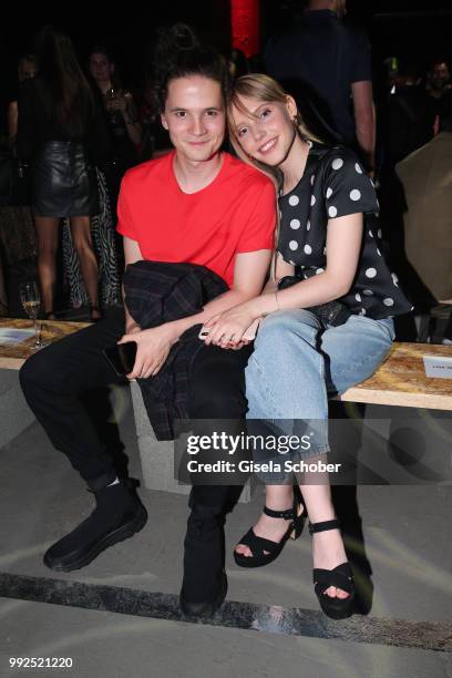 Tilmann Poerzgen and his girlfriend Lina-Larissa Strahl attend the HUGO show during the Berlin Fashion Week Spring/Summer 2019 at Motorwerk on July...