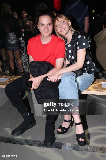 Tilmann Poerzgen and his girlfriend Lina-Larissa Strahl attend the HUGO show during the Berlin Fashion Week Spring/Summer 2019 at Motorwerk on July...