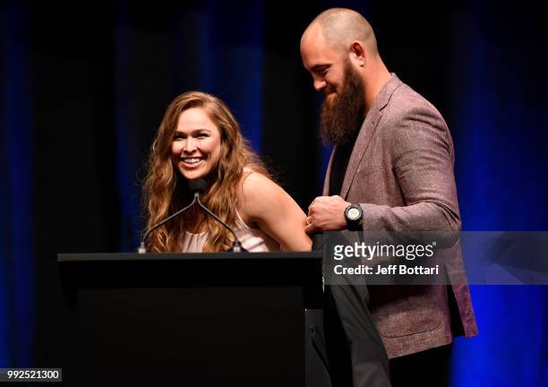 Ronda Rousey receives her hall of fame jacket after being inducted into the UFC Hall of Fame during the UFC Hall of Fame Class of 2018 Induction...