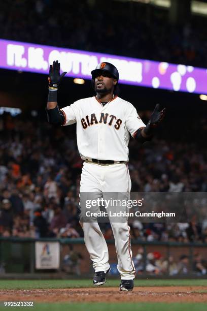 Alen Hanson of the San Francisco Giants celebrates after hitting a two-run home run in the sixth inning against the St Louis Cardinals at AT&T Park...