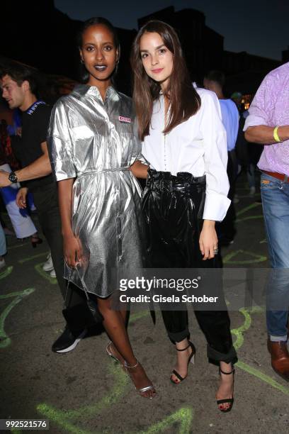 Sara Nuru and Luise Befort attend the HUGO show during the Berlin Fashion Week Spring/Summer 2019 at Motorwerk on July 5, 2018 in Berlin, Germany.