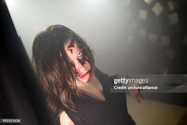 Horror performers scare people in the "Haunted House" during FearCon at the Maritim Hotel in Bonn, Germany, 20 October 2017. FearCon runs until 22...