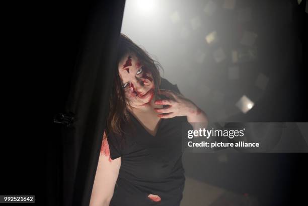 Horror performers scare people in the "Haunted House" during FearCon at the Maritim Hotel in Bonn, Germany, 20 October 2017. FearCon runs until 22...
