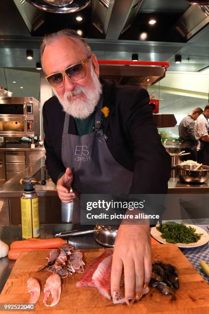 Artist Friedrich Lichtenstein preparing a bouillabaisse at BMW Welt in Munich, Germany, 20 October 2017. Friedrich Lichtenstein and chef Bobby...