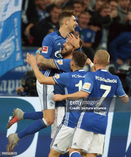 Leon Goretzka , Guido Burgstaller, Daniel Caligiuri and Max Meyer of Schalke celebrate Goretzka's goal for 1:0 during the German Bundesliga football...