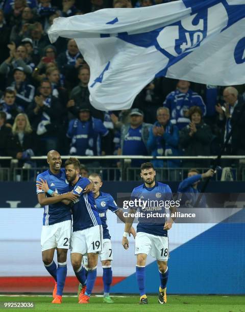 Schalke's Naldo , Guido Burgstaller, Max Meyer and Daniel Caligiuri celebrate the 2:0 goal during the German Bundesliga football match between FC...