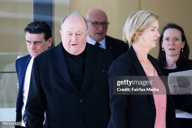 Adelaide Archbishop Philip Wilson arrives at Newcastle courthouse before being found guilty of concealing historical child sexual abuse on May 22,...