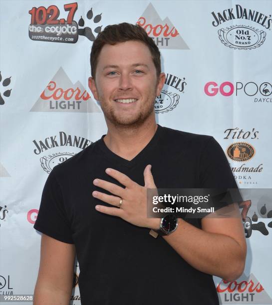 Recording artist Scotty McCreery shows off his wedding ring as he arrives at the Flamingo Go Pool Dayclub at Flamingo Las Vegas on July 5, 2018 in...