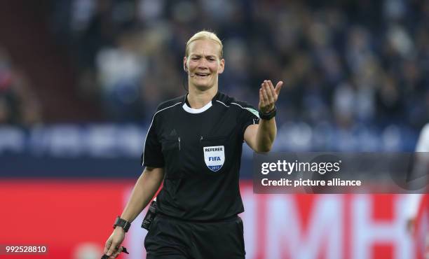 Referee Bibiana Steinhaus reacts during the German Bundesliga football match between FC Schalke 04 and FSV Mainz 05 in Gelsenkirchen, Germany, 20...