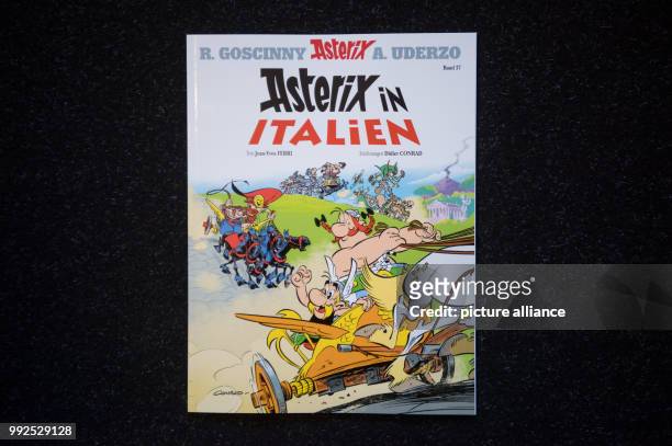 The German version of the Asterix comic book 'Asterix in Italien' , photographed in Stuttgart, Germany, 19 October 2017. Photo: Marijan Murat/dpa
