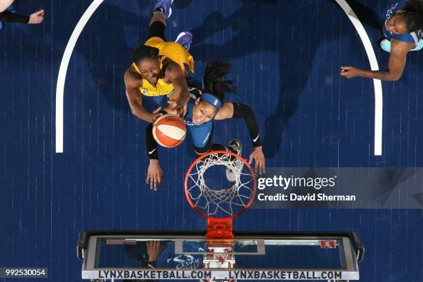 Nneka Ogwumike of the Los Angeles Sparks handles the ball against Maya Moore of the Minnesota Lynx on July 5, 2018 at Target Center in Minneapolis,...