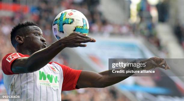 Augsburg's Daniel Opare in action during the German Bundesliga soccer match between FC Augsburg and Hanover 96 at the WWK Arena in Augsburg, Germany,...