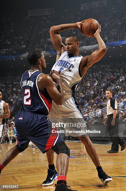 Rashard Lewis of the Orlando Magic looks to make a move against Joe Johnson of the Atlanta Hawks in Game Two of the Eastern Conference Semifinals...