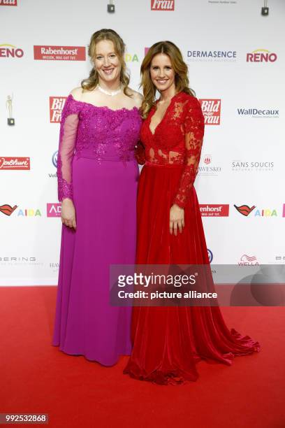 Award winner Anja Gehlken of 'Schaki e.V.' and her godmother, the actress Mareile Hoeppner, attend the award ceremny 'Goldene Bild der Frau' of the...