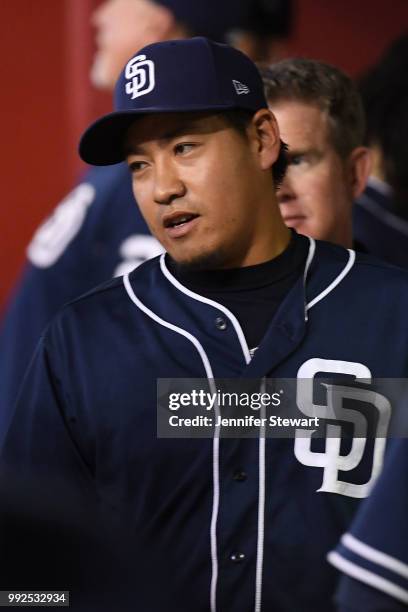 Kazuhisa Makita of the San Diego Padres reacts in the dugout after pitching in the eight inning of the MLB game against the Arizona Diamondbacks at...
