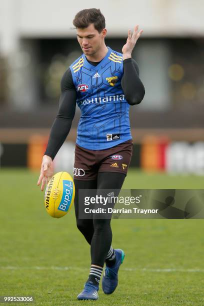 Jaeger O'Meara of the Hawks kicks the ball during a Hawthorn Hawks AFL Training Session at Waverley Park on July 6, 2018 in Melbourne, Australia.