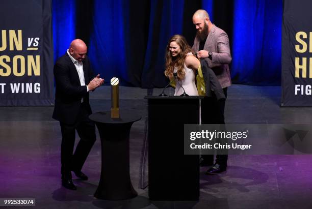 Ronda Rousey receives her hall of fame jacket after being inducted into the UFC Hall of Fame during the UFC Hall of Fame Class of 2018 Induction...