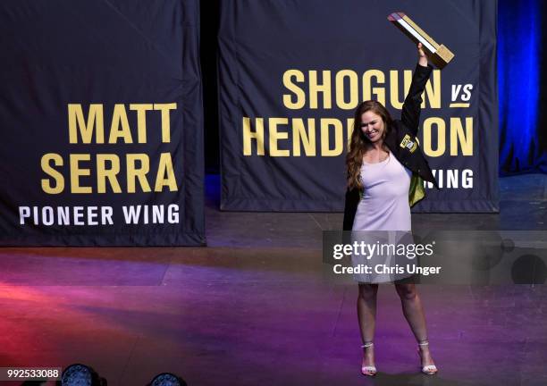 Ronda Rousey poses with her trophy after being inducted into the UFC Hall of Fame during the UFC Hall of Fame Class of 2018 Induction Ceremony inside...