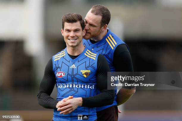 Jarryd Roughead gets in the ear of Jaeger O'Meara during a Hawthorn Hawks AFL Training Session at Waverley Park on July 6, 2018 in Melbourne,...