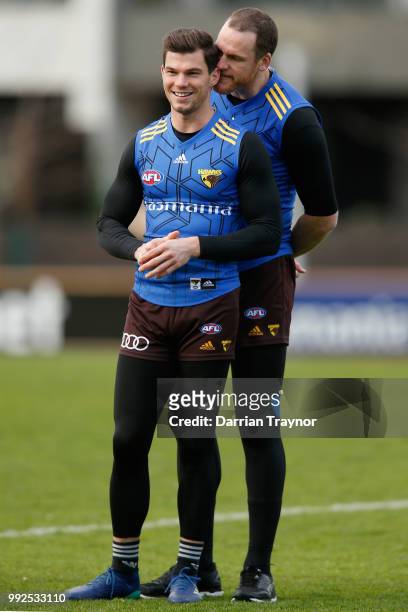 Jarryd Roughead gets in the ear of Jaeger O'Meara during a Hawthorn Hawks AFL Training Session at Waverley Park on July 6, 2018 in Melbourne,...