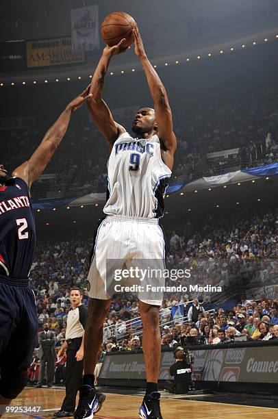 Rashard Lewis of the Orlando Magic shoots a jumper against Joe Johnson of the Atlanta Hawks in Game Two of the Eastern Conference Semifinals during...