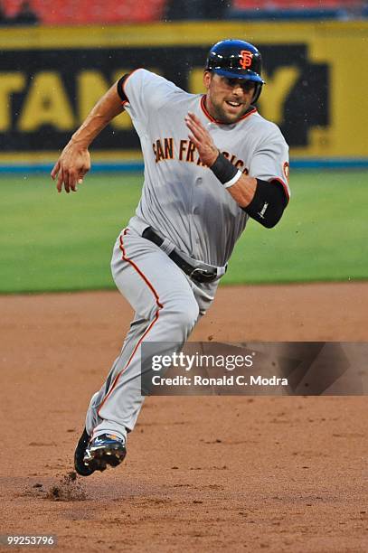 Mark DeRosa of the San Francisco Giants runs to third base during a MLB game against the Florida Marlins in Sun Life Stadium on May 6, 2010 in Miami,...