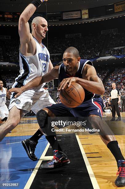 Al Horford of the Atlanta Hawks makes a move against Marcin Gortat of the Orlando Magic in Game Two of the Eastern Conference Semifinals during the...