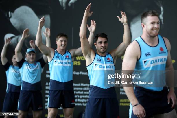 Nick Phipps of the Waratahs and team mates perform a drill during a Waratahs Super Rugby training session at Allianz Stadium on July 6, 2018 in...